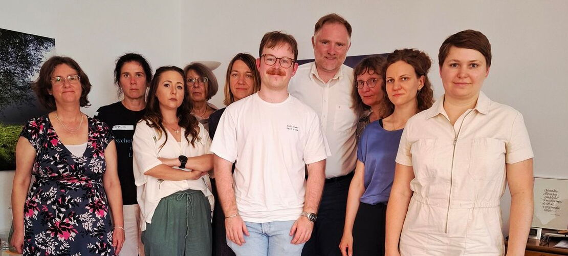 Gruppenbild um Frau Eisinger und Peter Aumer